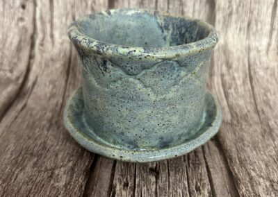 Tiny turquoise cup with saucer, Martha Conan Pottery, Pottery, Upstate New York Pottery, Syracuse Pottery, Syracuse Potter, Central New York Pottery, Potters in Central New York, Best Potters in Syracuse. Best Pottery in Syracuse, Best Pottery in Upstate New York, Best Pottery in Central New York, CNY Pottery, local pottery CNY