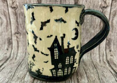 Halloween bats and haunted mansion mug, Martha Conan Pottery, Pottery, Upstate New York Pottery, Syracuse Pottery, Syracuse Potter, Central New York Pottery, Potters in Central New York, Best Potters in Syracuse. Best Pottery in Syracuse, Best Pottery in Upstate New York, Best Pottery in Central New York, CNY Pottery, local pottery CNY